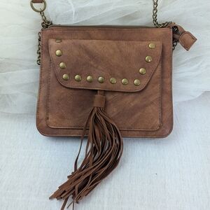 T-Shirt & Jeans Brown Faux Leather Tassel Crossbody Bag with gold stud accents.